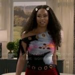 Chelsea’s floral asymmetric top with grommets on Beyond the Gates