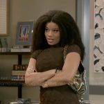 Eva’s brown textured dress and beaded bag on Beyond the Gates