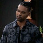 Izaiah’s black and grey printed jacket on Beyond the Gates
