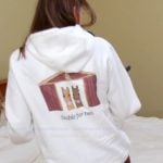 Janet’s white horse graphic hoodie on The Valley