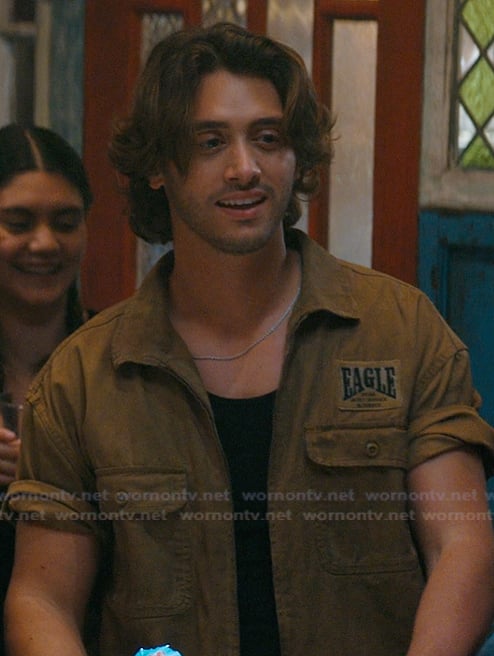 John’s khaki short sleeve shirt on Off Campus