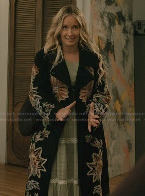 Juliet’s black floral embroidered coat on Elsbeth