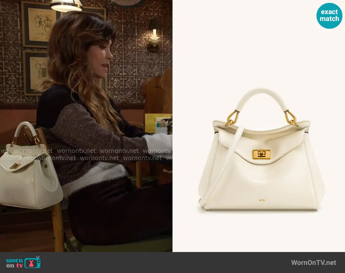 JW Pei Lucia Classic Top Handle Bag worn by Victoria Newman (Amelia Heinle) on The Young and the Restless