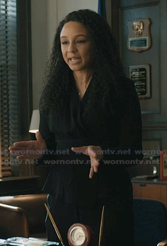 Kaya’s black wrap top on Elsbeth