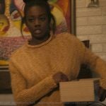 Kiesha’s orange knit sweater on The Chi