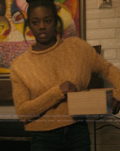 Kiesha’s orange knit sweater on The Chi