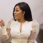 K's white sheer sleeve top on The Real Housewives of Atlanta
