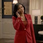 Leslie’s red suit on Beyond the Gates