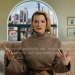 Lindsay’s brown turtleneck confessional sweater on In The City