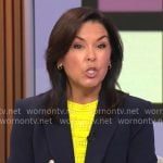 Meg Oliver’s navy blazer with gold buttons on CBS Evening News