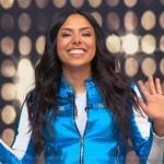 Michelle Khare's blue metallic leather jacket on Tamron Hall Show
