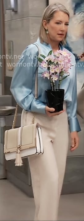 Nina’s light blue blouse on General Hospital