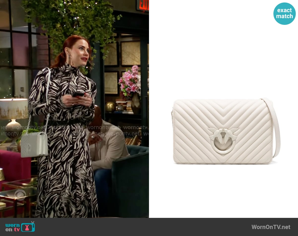 Pinko Love Click Classic cross body bag worn by Sally Spectra (Courtney Hope) on The Young and the Restless