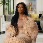 Porsha’s beige feather trim confessional dress on The Real Housewives of Atlanta