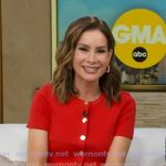 Rebecca’s red short sleeve cardigan and print skirt on Good Morning America