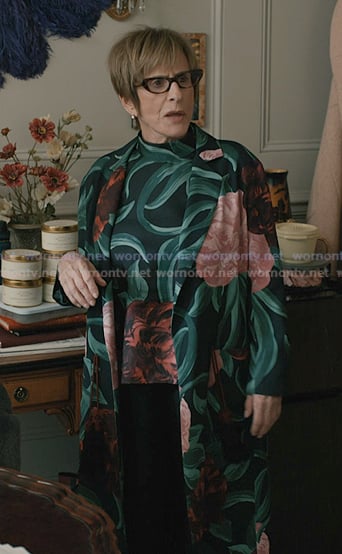 Ruby’s black floral print top and coat on Elsbeth