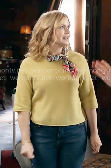 Sam’s chartreuse sweater and floral scarf on Ghosts