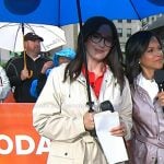 Savannah's white rain coat on Today