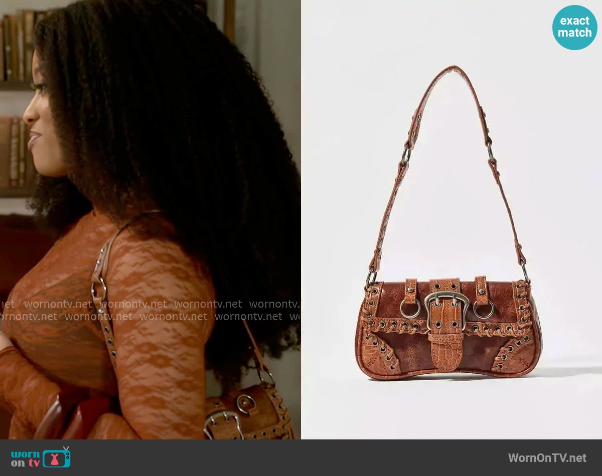 Silence + Noise Jade Laced Rivet Bag worn by Eva Thomas (Ambyr Michelle) on Beyond the Gates