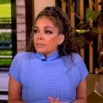 Sunny's blue turtleneck knit top on The View