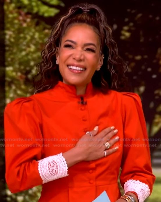 Sunny’s orange lace cuff jacket on The View