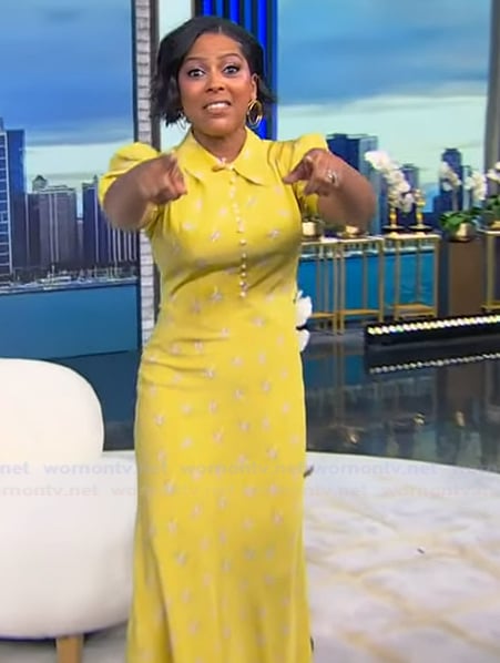 Tamron’s yellow floral print dress on Tamron Hall Show