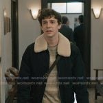 Teddy’s stripe sweater and navy shearling collar jacket on Elsbeth
