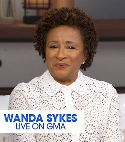 Wanda Sykes’s white eyelet short sleeve top on Good Morning America