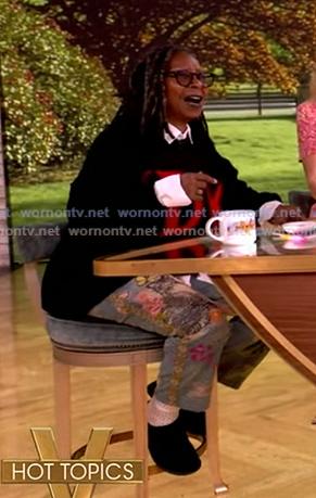 Whoopi’s black IDK sweater and embroidered pants on The View