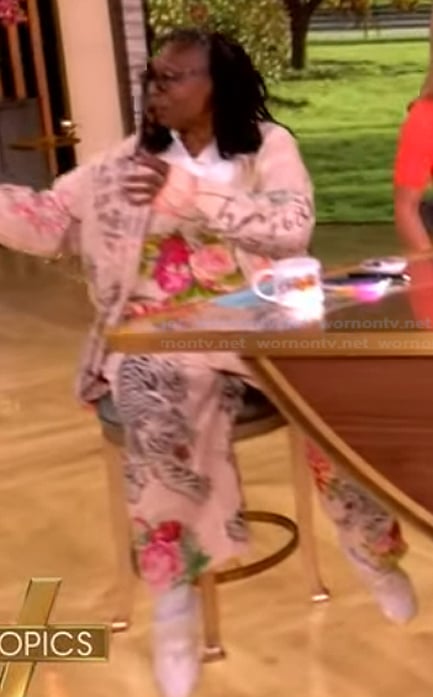 Whoopi’s embroidered denim overalls and printed shirt on The View