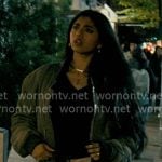 Abby's black knit top, green bomber jacket and patchwork mini skirt on Not Suitable For Work
