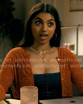 Abby’s denim corset top and orange cardigan on Not Suitable For Work