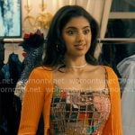Abby's patchwork corset top and orange cardigan on Not Suitable For Work