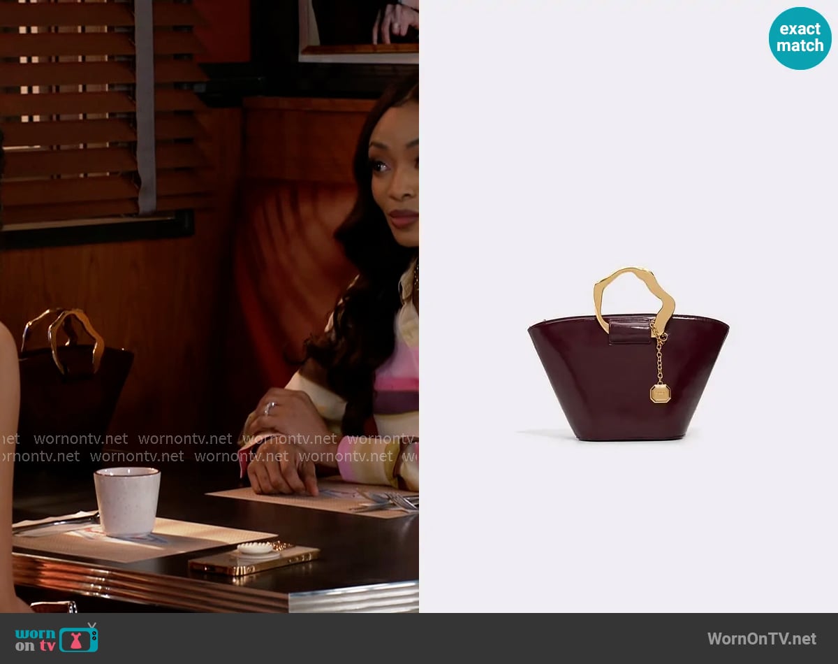 Aldo Goldenview Bag worn by Madison Montgomery (Kenjah) on Beyond the Gates