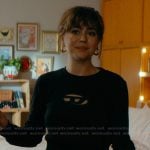 Allie’s black cutout sweatshirt on Off Campus