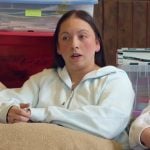 Alli’s light blue hoodie on The McBee Dynasty Real American Cowboys