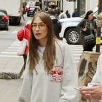 Amanda’s gray varsity sweatshirt on In The City