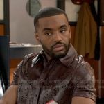 Andre's brown leather shirt with cutouts on Beyond the Gates