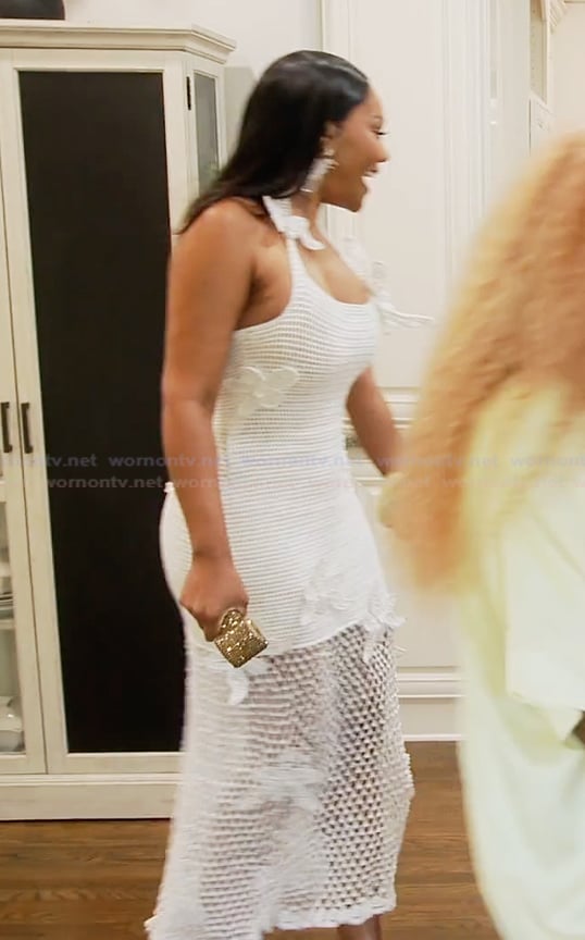 Angela’s white crochet knit dress on The Real Housewives of Atlanta