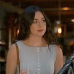 Annie’s blue sleeveless top and yellow floral mini skirt on Sweet Magnolias