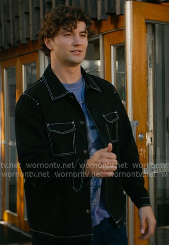 Beau’s black jacket with white stitching on Off Campus