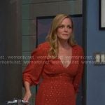 Belle's orange v-neck tiered dress on Days of our Lives