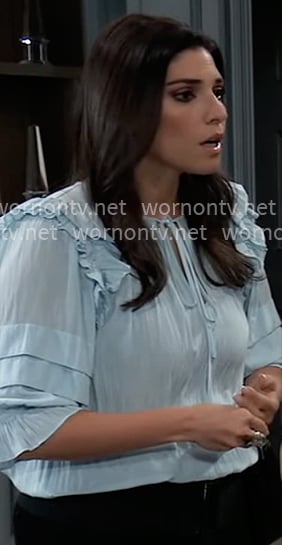 Brook Lynn’s light blue ruffle blouse on General Hospital
