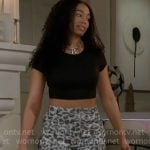 Chelsea's black crop top and leopard print cargo pants on Beyond the Gates
