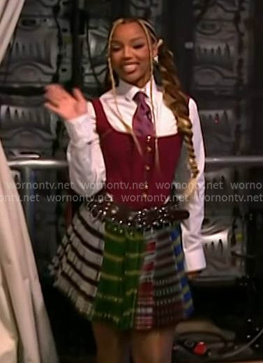 Chloe Bailey’s burgundy corset top and plaid pleated skirt on Today