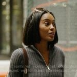 Ciara’s grey ribbed zip sweater and plaid sheer skirt on In The City