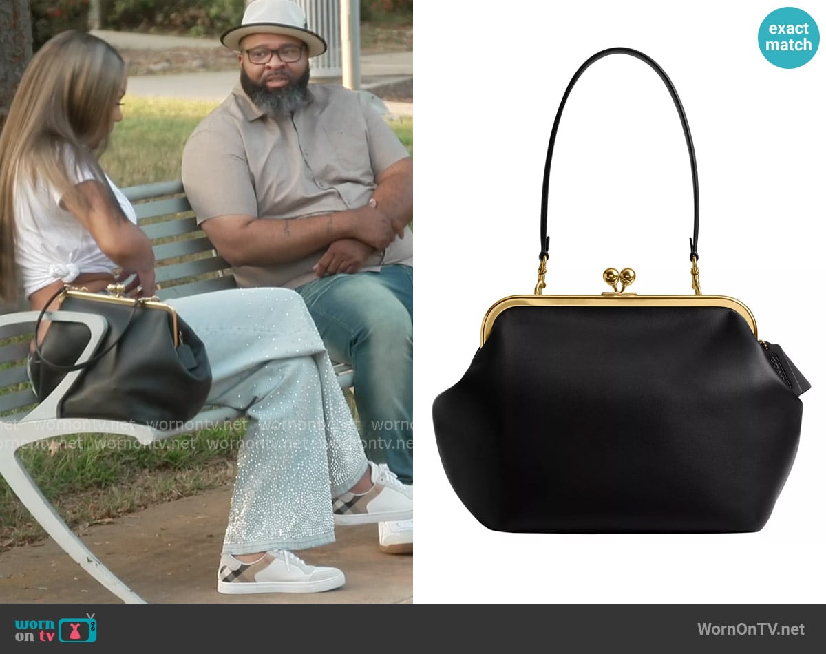 Coach Kisslock Medium Leather Frame Bag worn by Drew Sidora on The Real Housewives of Atlanta
