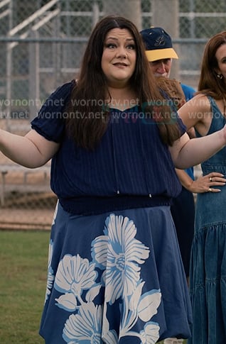 Dana’s navy ribbed top and floral print skirt on Sweet Magnolias
