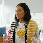 Danielle’s smiley face tee and multicolor striped cardigan on In The City