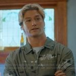 Dean’s gray floral jacket on Off Campus